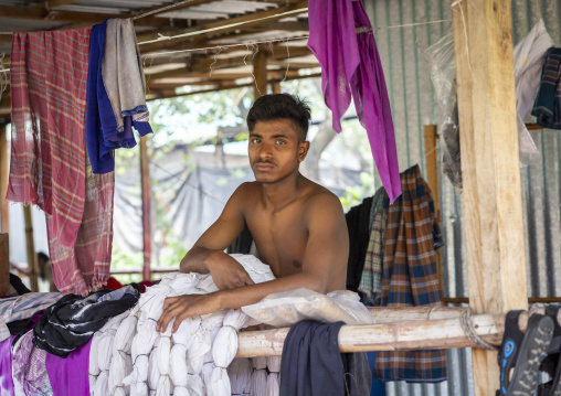 Bangladeshi man working in a batik factory, Dhaka Division, Rupganj, Bangladesh