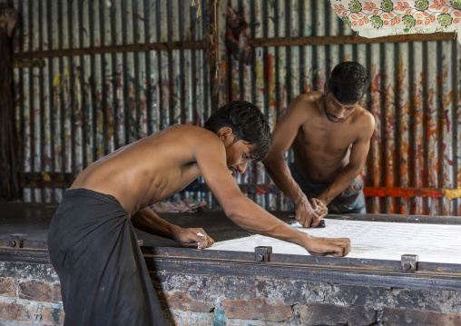 Bangladeshi workers making manual screen printing, Dhaka Division, Rupganj, Bangladesh