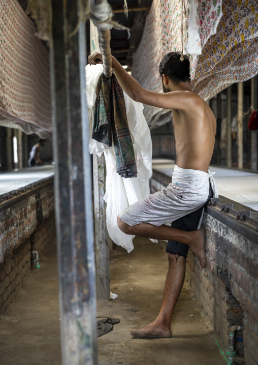 Bangladeshi worker in a block printing workshop, Dhaka Division, Rupganj, Bangladesh