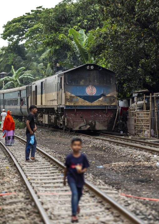 Train crossing a slum, Chittagong Division, Chittagong, Bangladesh