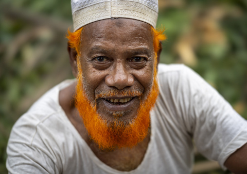 Portrait of a bangladeshi man with a beard dyed in henna, Chittagong Division, Chittagong, Bangladesh