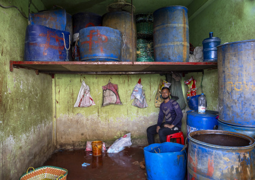 Bangladeshi man in a workshop at fish market, Chittagong Division, Chittagong, Bangladesh