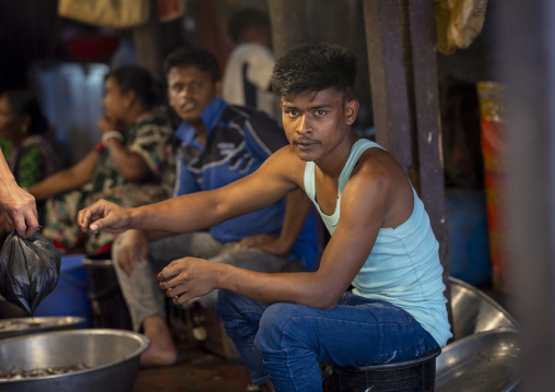 Chakma tribe man selling fish, Chittagong Division, Rangamati Sadar, Bangladesh