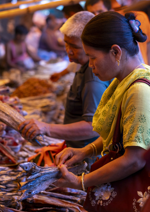 Chakma tribe people buying dried fishes at market, Chittagong Division, Rangamati Sadar, Bangladesh