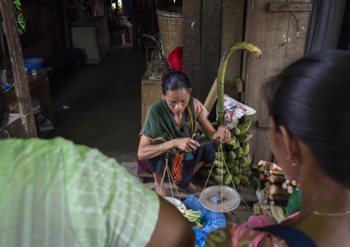 Chakma tribe woman selling vegetables at market, Chittagong Division, Rangamati Sadar, Bangladesh