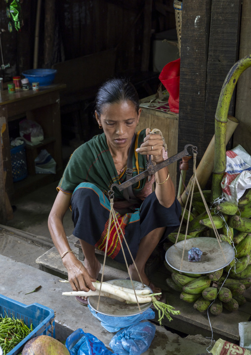 Chakma tribe woman selling vegetables at market, Chittagong Division, Rangamati Sadar, Bangladesh