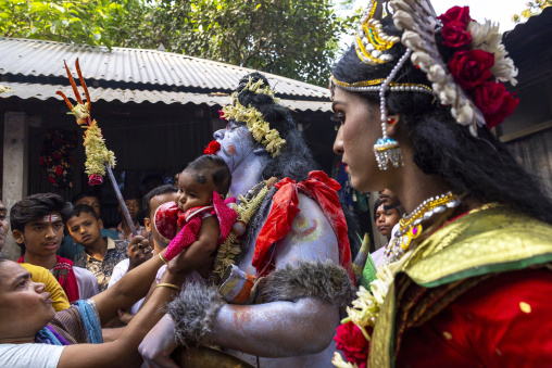 Lord Shiva procession with devotees at Lal Kach festival, Dhaka Division, Tongibari, Bangladesh