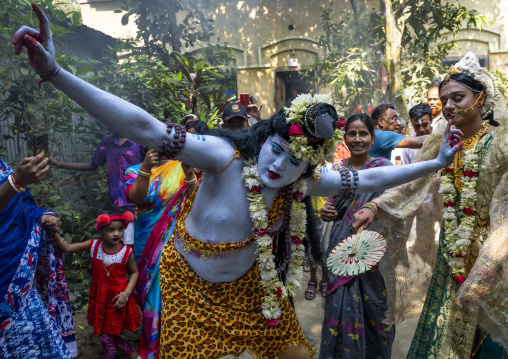 Lord Shiva and Parvati procession with devotees during Lal Kach festival, Dhaka Division, Tongibari, Bangladesh