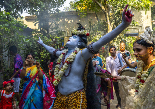 Lord Shiva and Parvati procession with devotees during Lal Kach festival, Dhaka Division, Tongibari, Bangladesh