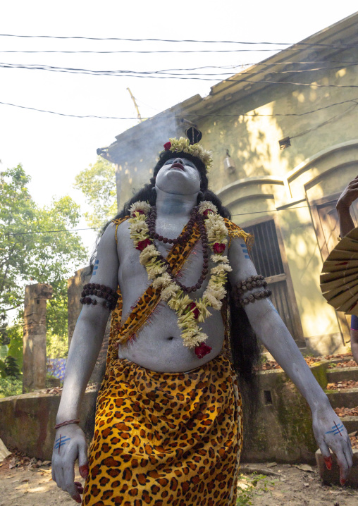 Lord Shiva procession with devotees at Lal Kach festival, Dhaka Division, Tongibari, Bangladesh