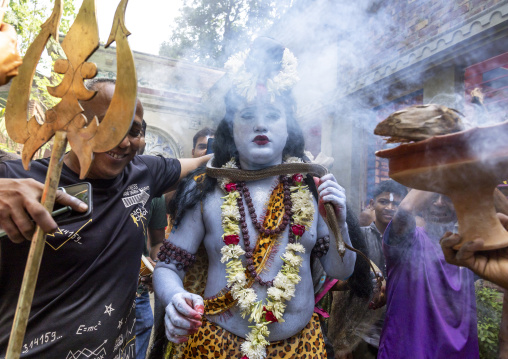 Lord Shiva procession with devotees at Lal Kach festival, Dhaka Division, Tongibari, Bangladesh