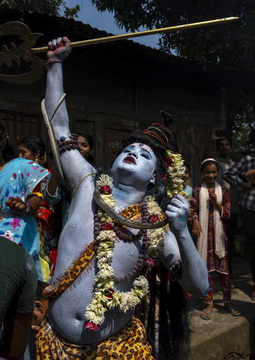 Lord Shiva procession with devotees at Lal Kach festival, Dhaka Division, Tongibari, Bangladesh