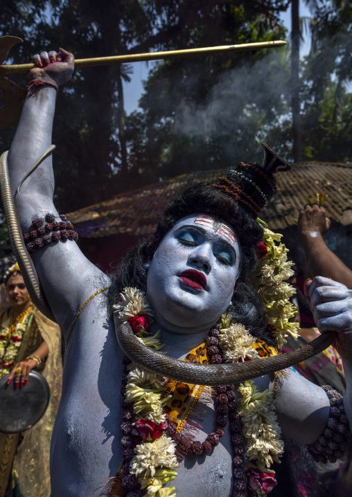 Lord Shiva procession with devotees at Lal Kach festival, Dhaka Division, Tongibari, Bangladesh