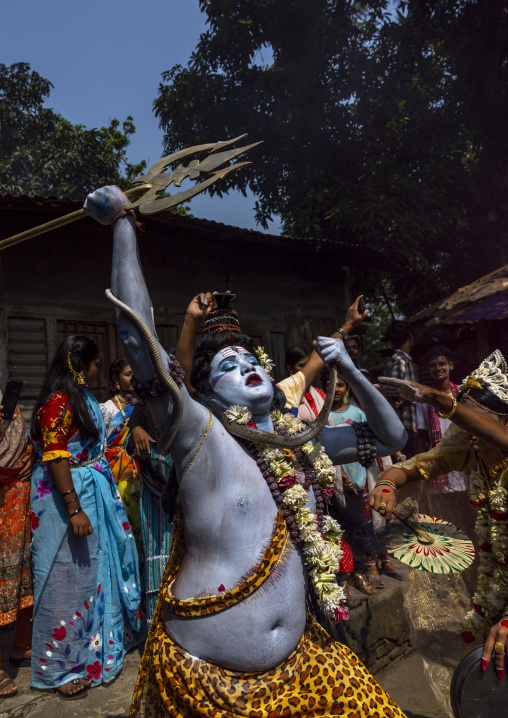 Lord Shiva procession with devotees at Lal Kach festival, Dhaka Division, Tongibari, Bangladesh