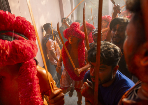 Hindu devotees covered with orange color in Lal Kach festival, Dhaka Division, Munshiganj Sadar, Bangladesh