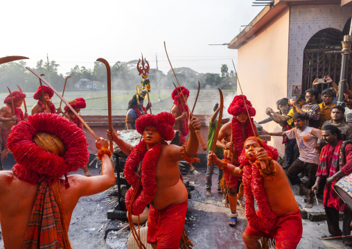 Hindu devotees covered with orange color in Lal Kach festival, Dhaka Division, Munshiganj Sadar, Bangladesh