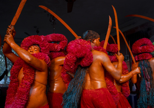 Hindu devotees covered with orange color in Lal Kach festival, Dhaka Division, Munshiganj Sadar, Bangladesh