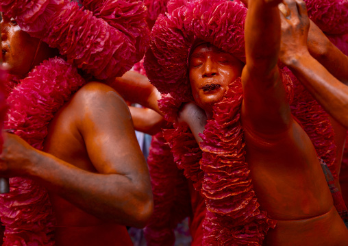 Hindu devotees covered with orange color in Lal Kach festival, Dhaka Division, Munshiganj Sadar, Bangladesh