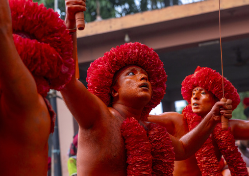 Hindu devotees covered with orange color in Lal Kach festival, Dhaka Division, Munshiganj Sadar, Bangladesh