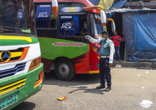 Bangladeshi traffic security officer in the street, Dhaka Division, Dhaka, Bangladesh