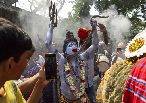Lord Shiva procession with devotees at Lal Kach festival, Dhaka Division, Munshiganj, Bangladesh