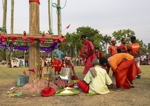 Devotees making offerings before body suspension during Charak Puja, Sylhet Division, Kamalganj, Bangladesh