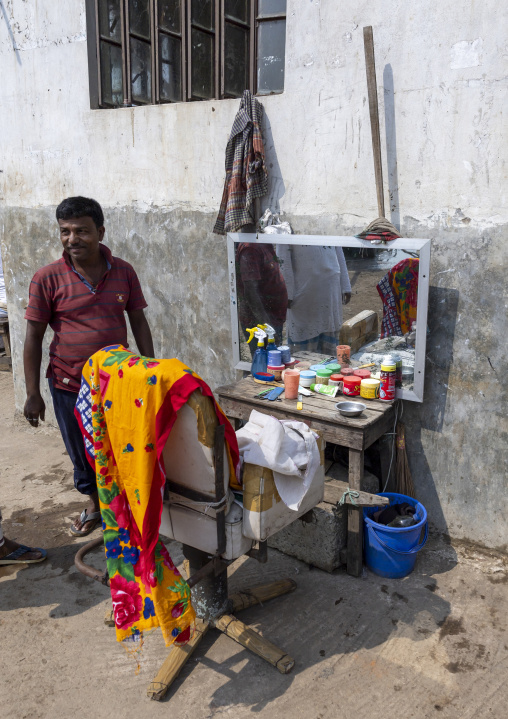 Street barber in the fish market, Chittagong Division, Chittagong, Bangladesh