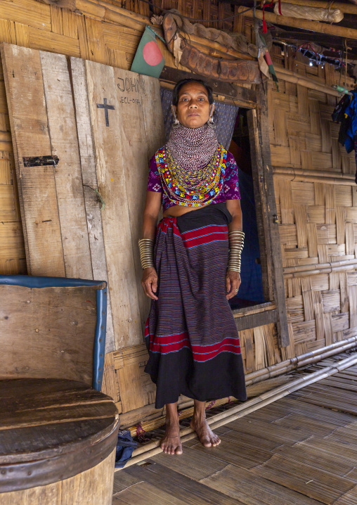 Portrait of a Tripura tribe woman with traditional necklaces and earrings, Chittagong Division, Rowangchhari, Bangladesh