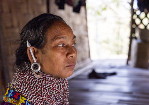 Portrait of a Tripura tribe woman with traditional necklaces and earrings, Chittagong Division, Rowangchhari, Bangladesh