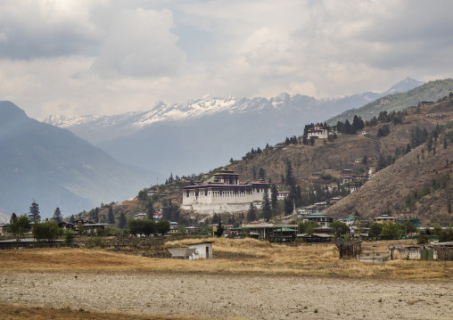 Dzong overlooking fields, Wangchang Gewog, Paro, Bhutan
