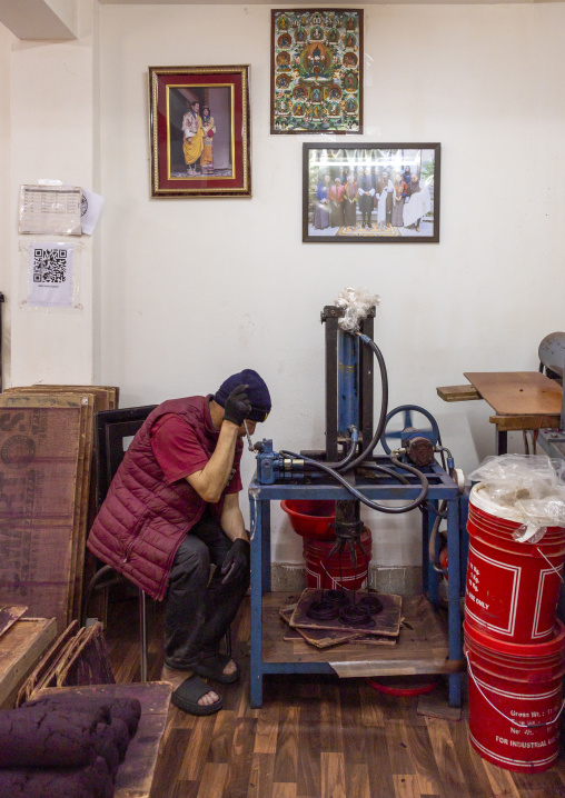 Bhutanese man manufacturing Incense sticks, Chang Gewog, Thimphu, Bhutan