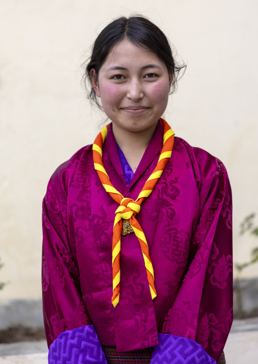 Portrait of a bhutanese teenage girl in kira, Chang Gewog, Thimphu, Bhutan