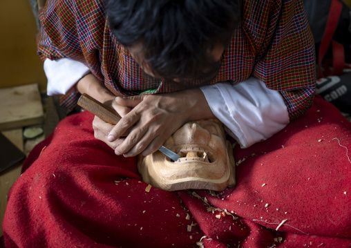 Bhutanese artist carving a wooden mask, Chang Gewog, Thimphu, Bhutan