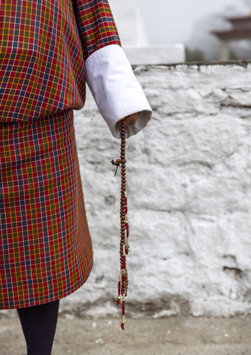 Butanese man with a prayer beads, Punakha, Dochula Pass, Bhutan