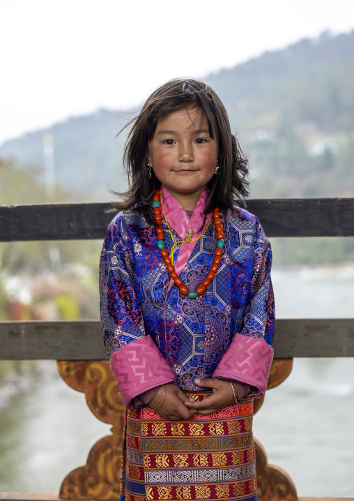 Bhutanese girl in kira traditional clothing in Punakha Dzong, Punakha dzongkhag, Punakha, Bhutan