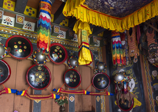 Shields on a wall inside Nyenzer Lhakhang, Thedtsho Gewog, Wangdue Phodrang, Bhutan