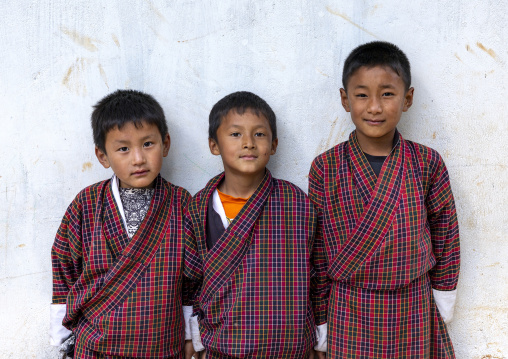 Portrait of three bhutanese boys in Rubesa Primary School, Wangdue Phodrang, Rubesagewog, Bhutan