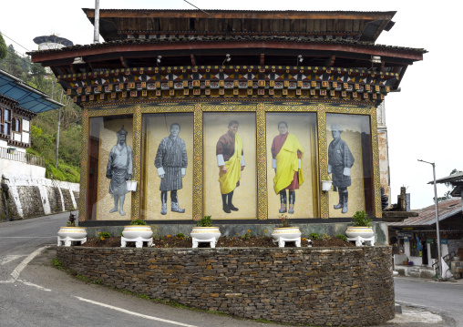 Pictures of the bhutanese kings on the road, Trongsa District, Trongsa, Bhutan