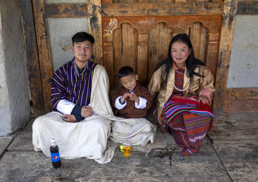 Bhutanese family in Ura Lhakhang monastery, Bumthang, Ura, Bhutan