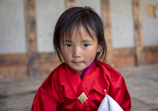 Bhutanese girl in Ura Lhakhang monastery, Bumthang, Ura, Bhutan