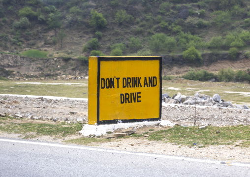 Sign along the road to prevent from drinking and driving, Wangchang Gewog, Paro, Bhutan