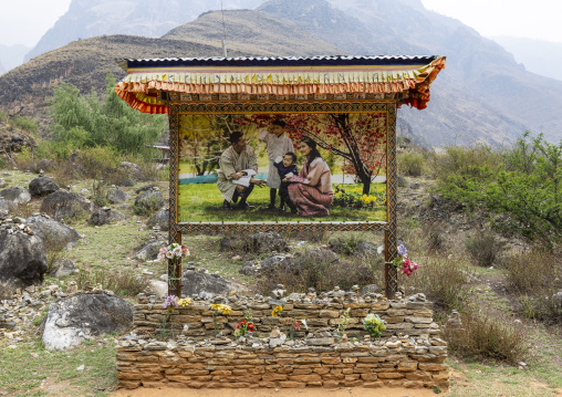 BIllboard on the road depicting the royal family, Wangchang Gewog, Paro, Bhutan