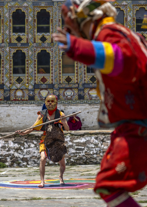 Masked atsaras at the annual Ura Yakchoe festival, Bumthang, Ura, Bhutan