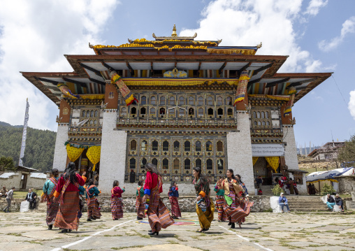 Bhutanese women dancing during Ura Yakchoe festival, Bumthang, Ura, Bhutan