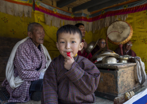 Bhutanese boy during Ura Yakchoe festival, Bumthang, Ura, Bhutan