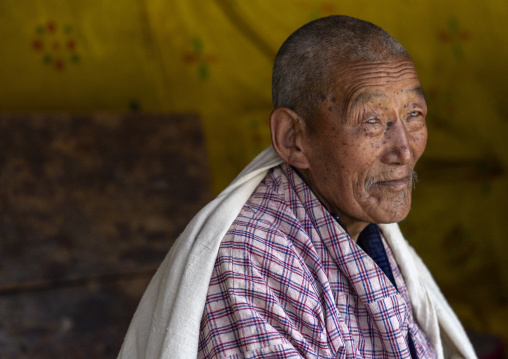 Bhutanese old man in Ura Yakchoe festival, Bumthang, Ura, Bhutan