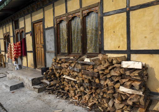 Firewood in front of a house, Chhoekhor Gewog, Bumthang, Bhutan