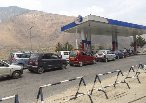 Cars filling gas at a gas station, Wangchang Gewog, Paro, Bhutan