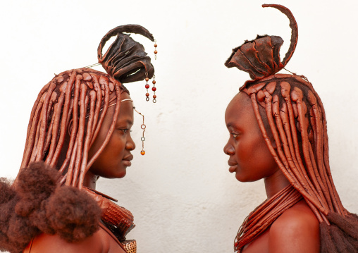 Himba tribe women covered with otjize, Cunene province, Oncocua, Angola