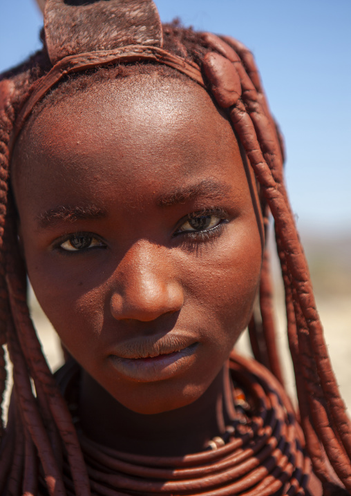 Portrait of a Himba tribe woman covered with otjize, Cunene province, Oncocua, Angola